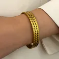 Elegant vintage gold-finished braided stainless steel cuff bracelet with bohemian design - Wheat Ear Weave (DZ-128)