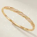 Elegante bracciale a onde placcato oro 18K con pietre di zircone scintillanti per lei - Stile a Onda Intrecciata di Lusso (BS-J5639G) / Oro