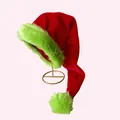 Red plush Christmas hat with vibrant green faux fur trim and pom-pom on stand. - Green Trim Extra Long Christmas Hat Adult (80CM) / Red Hat with Green Trim