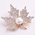 Vintage baroque maple leaf brooch pin with sparkling rhinestones and center pearl accent - Maple Leaf