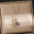 Elegant gold heart pendant necklace featuring blue gemstone and crystal accents details - 181#XL1997-29