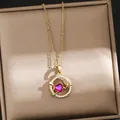 Elegant gold-tone stainless steel heart necklace with pink stone on jewelry box - 182#XL1997-30