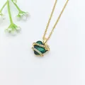Elegant gold-tone necklace with a radiant heart-shaped emerald green crystal pendant. - 200#XL2605-027