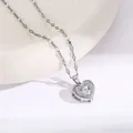 Elegant silver-toned heart pendant necklace with shimmering CZ stones on a fine metal chain - 206#XL2604-020