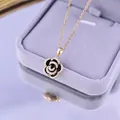 Elegant gold-finished rose pendant necklace with black enamel and crystal accents. - 207#xl1348 - Camellia Necklace