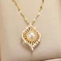 Elegant golden stainless steel necklace featuring a round pearl and crystal pendant - 217#XL1470-022