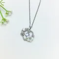 Elegant silver stainless steel necklace featuring a floral butterfly circular pendant design - 220#XL1200-291