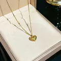 Elegant gold stainless steel heart pendant necklace with Love engraving detail for women - 104#XL1338-19