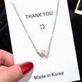 Elegant silver stainless steel W-shaped pendant necklace on card with red nail detail - 108#xl1341 Steel Color