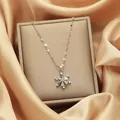 Elegant silver stainless steel snowflake pendant necklace on a champagne silk background - 123#xl1374-2 Lip Chain Snowflake