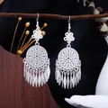 Orecchini etnici Miao in argento con lunghe nappe e intricati motivi circolari traforati - E2031-2 (Nappa a Foglia di Fiore Tondo Traforato) / Argento