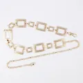 Elegant gold-tone geometric metal waist chain belt featuring a unique hammered texture finish - Frosted Hollow Square Waist Chain (Gold)