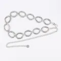 Vintage silver metal waist chain belt with circular links and a small flower charm - Sun Halo Pattern Hollow Oval Waist Chain (Silver)