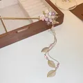 Elegant gold Chinese hair stick featuring magnolia flowers and a dangling leaf tassel. - Pink Flower Butterfly Long Tassel