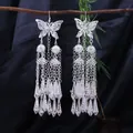 Orecchini a farfalla stile Miao in argento con lunghe nappe per un look etnico - Pendaglio a Cono Multistrato Farfalla (E3467) / Argento