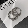 Chic silver metallic pignose chain link hoop earrings with high-gloss mirror finish. - Silver