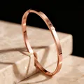 Minimalist 8mm rose gold stainless steel hinged bangle bracelet on marble. - Style Width / Rose Gold