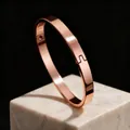 Minimalist 8mm rose gold stainless steel bangle with polished finish and hinge clasp - 6mm Width Oval / Rose Gold