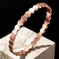Elegant rose gold hexagonal geometric stainless steel bangle in a polished finish - Rose Gold Honeycomb Plain Style (32-D-11)