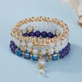 Detailansicht eines mehrlagigen böhmischen Perlenarmband-Sets mit Kristallanhänger - Lila