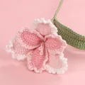 Detailed macro photography of a handmade pink and white crochet lily flower yarn art gift - Parrot Tulip Branch / Gradient Pink