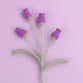 Handmade purple crochet bellflower with green stems and leaves on a light purple background - Lantern Flower Branch / Deep purple