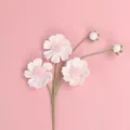 Hand-crocheted white and pink yarn daisy flower bouquet presented on a pink background - 3-head Cosmos Stem / Pink White