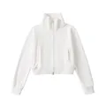 Sudadera corta blanca con cuello alto y cremallera para mujer con estilo minimalista - S / Beige