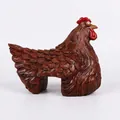 Detailed side view of a resin rooster figurine designed for garden fence decoration - Brown