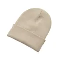 Warm beige knitted beanie hat with classic ribbed texture for autumn and winter - Apricot