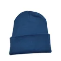 Classic warm knitted beanie hat in solid peacock blue color for autumn and winter - Teal