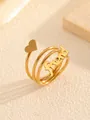 Primo piano di un anello a spirale dorato con un cuore e la scritta 'friend' incisa - Stile con lettera 'Friend' e cuore (Oro 2#) / Oro