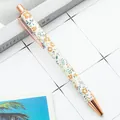 Elegant rose gold retractable ballpoint pen with a cream floral pattern wrap design - 1.0mm Bullet Tip / Style A Small Flower White