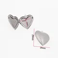 Close-up of heart-shaped stainless steel locket with 29mm dimensions and scale pattern. - Yy021