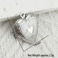 Detailed close-up of a silver stainless steel heart locket pendant with 22.6x19mm dimensions - Retro Texture Heart Style (YY027)