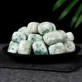 Natural white tumbled healing stones in a black bowl for home decoration and yoga meditation. - Phoenix Stone (2-3cm) / 100g Pack