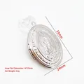 Silver oval stainless steel Virgin Mary photo locket with dimension labels - Virgin Mary Relief Oval Style (YY013)