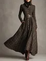Detailed look at an elegant plaid shirt maxi dress with a leather belt on a model - S / Plaid
