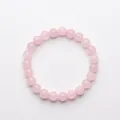Elegant natural rose quartz beaded bracelet featuring smooth round pink crystal stones - Pink Crystal