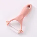 Multifunctional pink ceramic peeler with ergonomic handle for fruit and vegetable skin - Ceramic Style / Pink