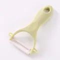 Ergonomic ceramic vegetable fruit peeler in light yellow for kitchen potato skin - Ceramic Style / Green