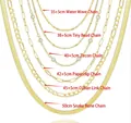 Detailed view of six styles and lengths of 14K gold-plated layered necklaces - 6-Piece Necklace Set / Gold