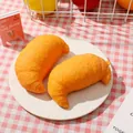 Realistic orange croissant squishy toy for stress relief and sensory play in a bakery setting - 1 Croissant (made With Flour)