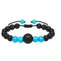 Handmade adjustable braided bracelet featuring black lava stones and blue turquoise beads - Turquoise