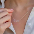 Elegant silver safety pin pendant necklace with sparkling cubic zirconia inlay - Zirconia Paperclip Necklace / Silver
