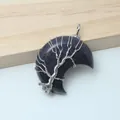 Detailed view of wire wrapped tree of life on a blue sandstone crescent moon pendant - Blue Sandstone