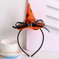 Detailed view of a festive orange Halloween witch hat headband with black bow and mesh veil. - Orange Black Cat Star and Broom Style