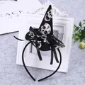 Detailed view of Halloween witch hat headband with skull pattern and black bow - Black Red-Eyed Skull Style