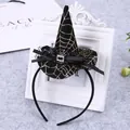 Close-up view of a Halloween witch hat headband featuring a gold spider web pattern - Black and Gold Spider Web Style