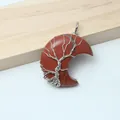 Handmade red stone crescent moon pendant with silver wire-wrapped tree of life design. - Red Jasper